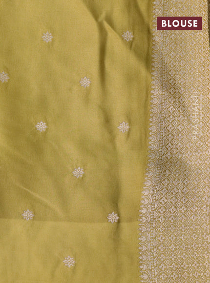 Mushru silk saree mustard green with zari woven buttas and zari woven butta border