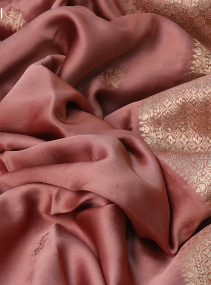 Mushru silk saree pastel peach with zari woven buttas and zari woven butta border