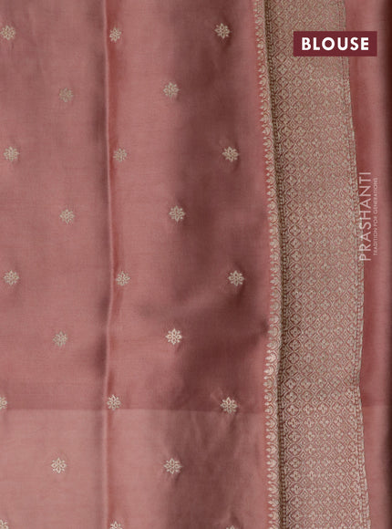 Mushru silk saree pastel peach with zari woven buttas and zari woven butta border