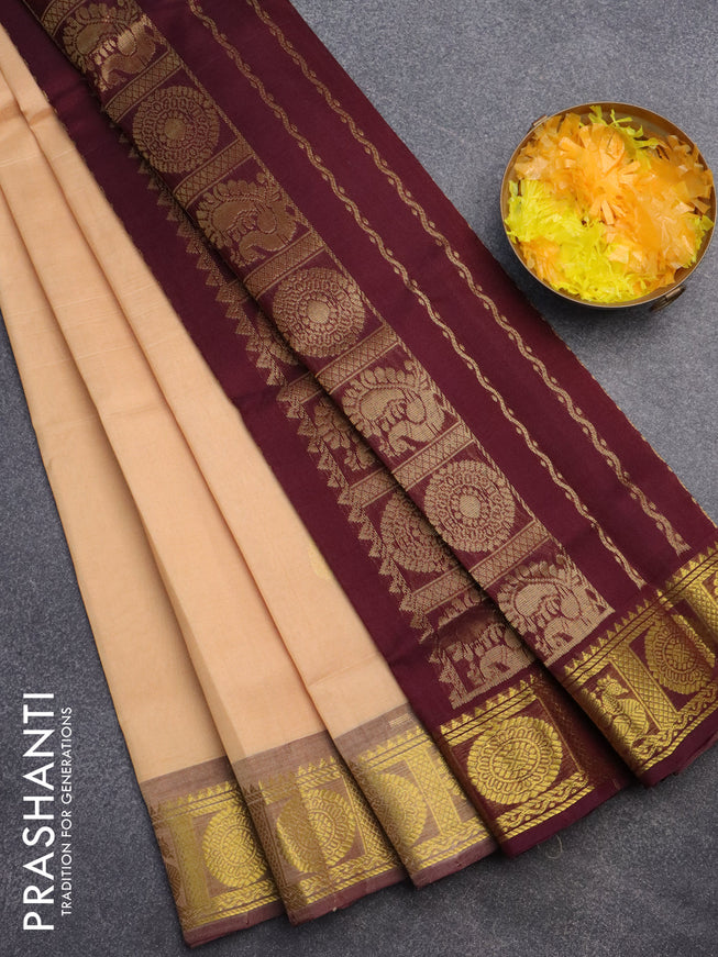 Silk cotton saree sandal and wine shade with zari woven buttas and annam & rudhraksha zari woven border