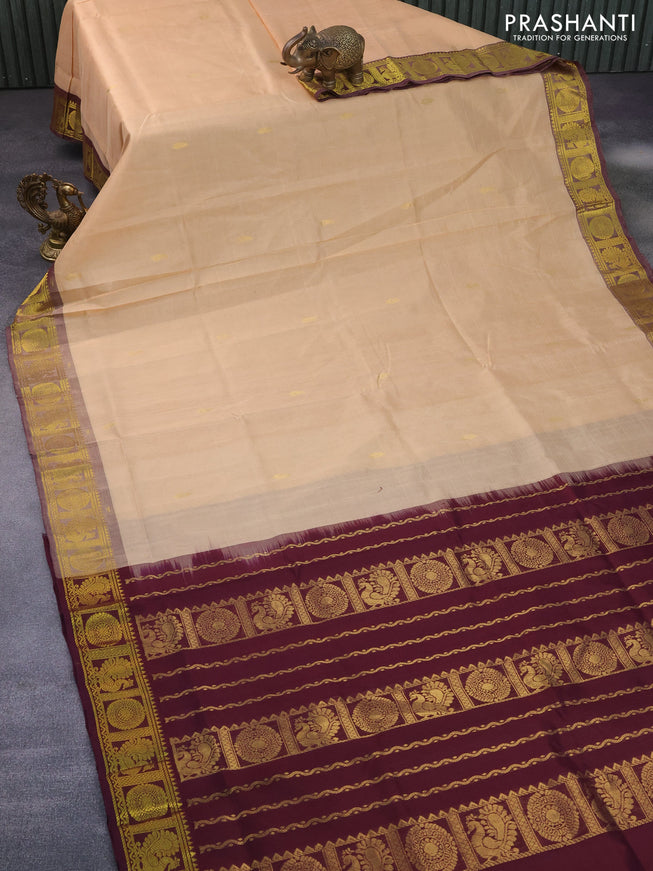 Silk cotton saree sandal and wine shade with zari woven buttas and annam & rudhraksha zari woven border