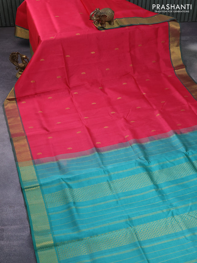 Silk cotton saree pink shade and teal green shade with paisley zari woven buttas and zari woven border