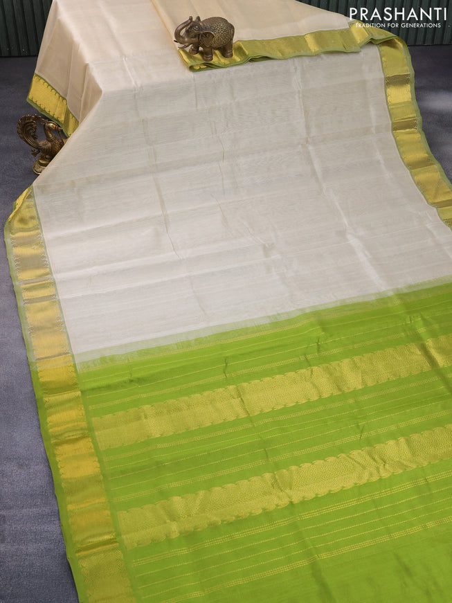 Silk cotton saree cream and light green with allover vairaosi pattern and zari woven border