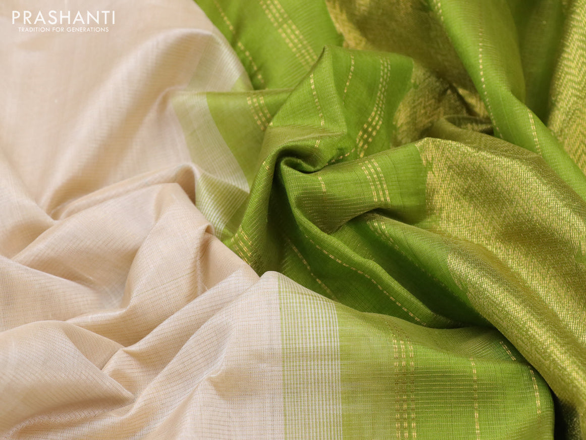 Silk cotton saree cream and light green with allover vairaosi pattern and zari woven border