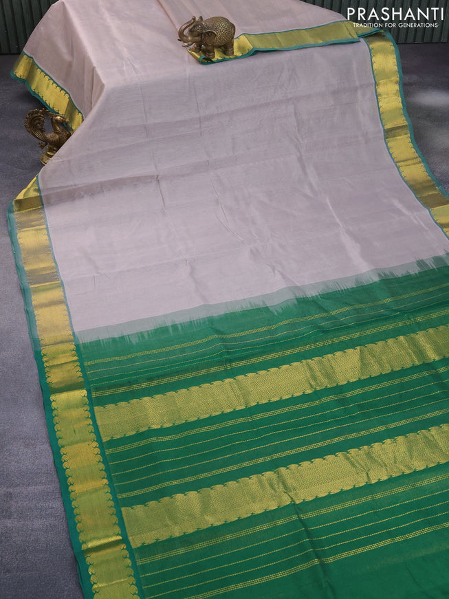 Silk cotton saree pastel grey and green with allover vairaosi pattern and zari woven border