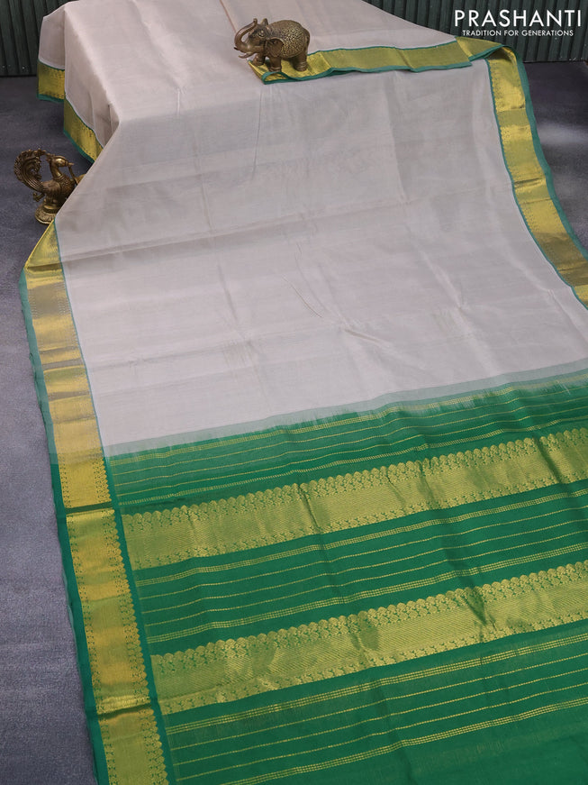 Silk cotton saree pastel grey and green with allover vairaosi pattern and zari woven border