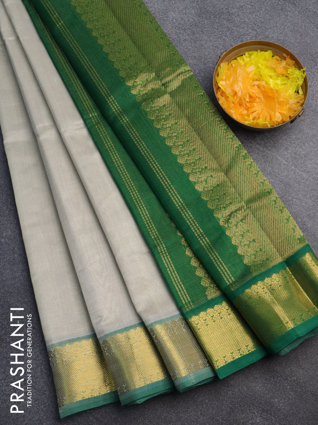 Silk cotton saree pastel grey and green with allover vairaosi pattern and zari woven border