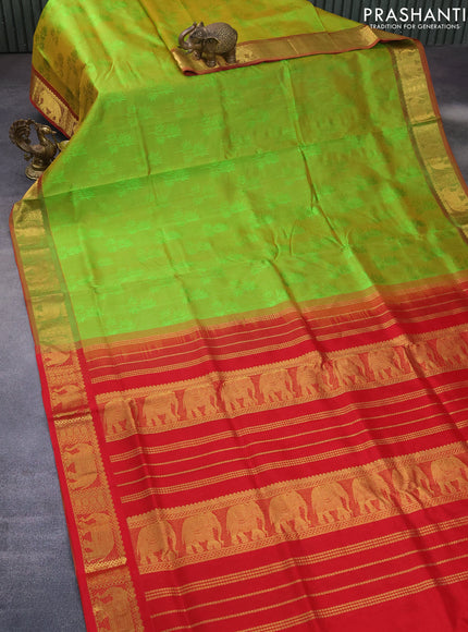 Silk cotton saree light green and red with allover self emboss jacquard and elephant zari woven border