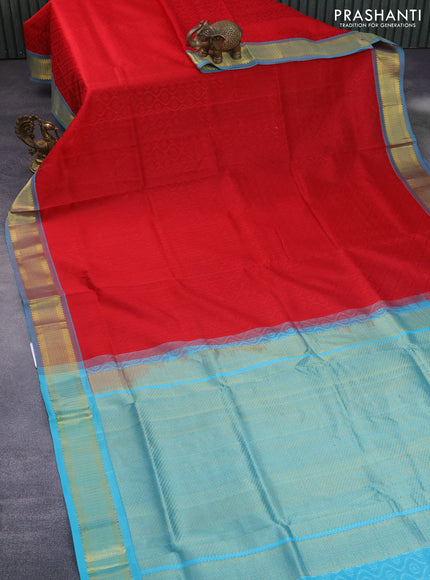 Silk cotton saree red and teal blue with allover self emboss jacquard and zari woven border