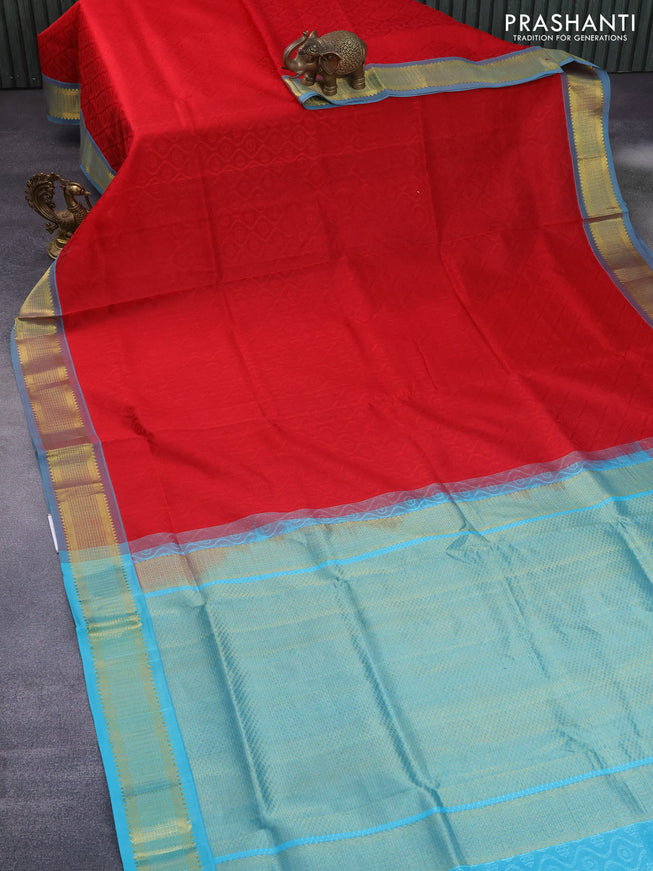 Silk cotton saree red and teal blue with allover self emboss jacquard and zari woven border