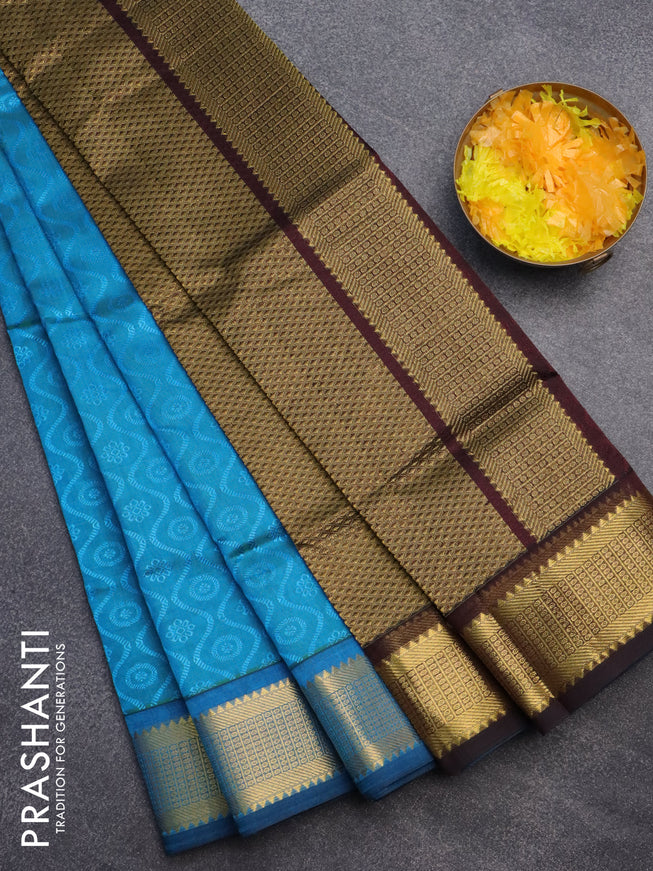 Silk cotton saree light blue and deep coffee brown with allover self emboss jacquard and zari woven border