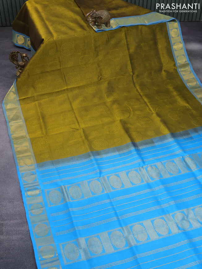 Silk cotton saree mehendi green and blue with allover self emboss jacquard and zari woven border