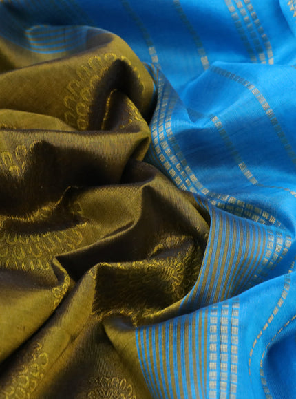 Silk cotton saree mehendi green and blue with allover self emboss jacquard and zari woven border