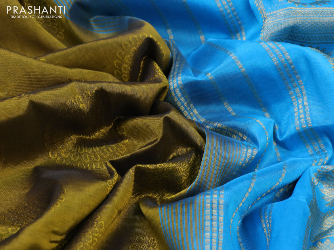 Silk cotton saree mehendi green and blue with allover self emboss jacquard and zari woven border