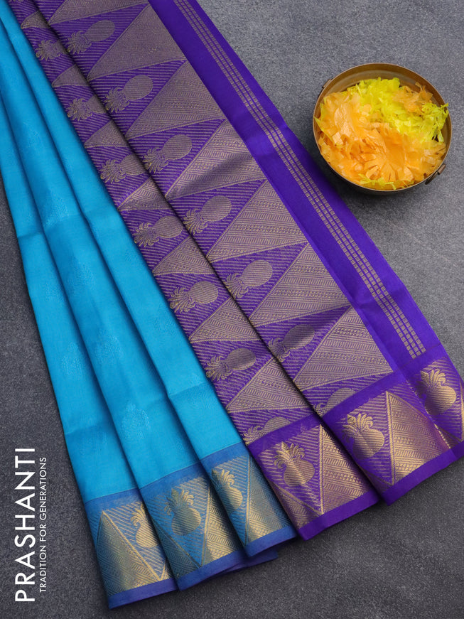 Silk cotton saree teal blue and blue with allover self emboss jacquard and zari woven border