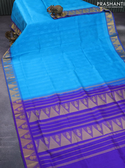 Silk cotton saree teal blue and blue with allover self emboss jacquard and zari woven border