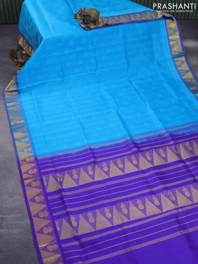 Silk cotton saree teal blue and blue with allover self emboss jacquard and zari woven border