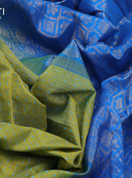 Silk cotton saree lime green and cs blue with allover small thread checks & buttas and zari woven border