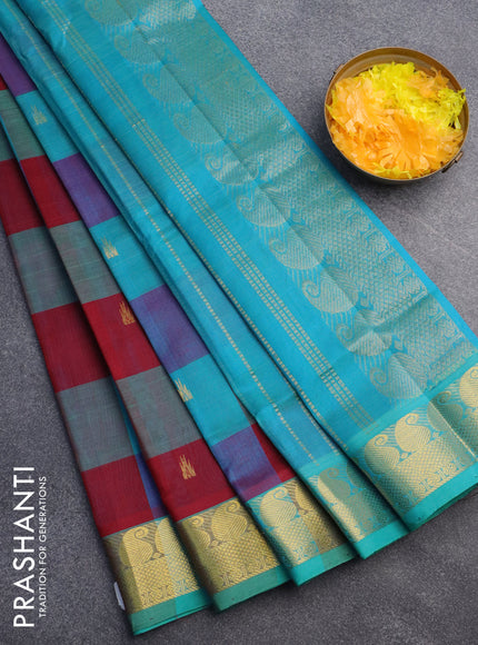 Silk cotton saree maroon and cs blue with allover paalum pazhamum checks & buttas and paisley zari woven border