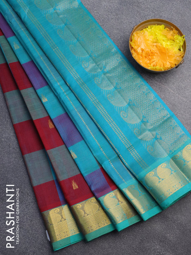 Silk cotton saree maroon and cs blue with allover paalum pazhamum checks & buttas and paisley zari woven border