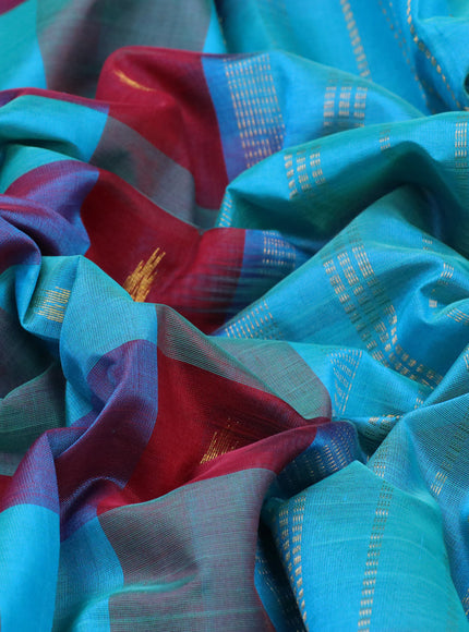 Silk cotton saree maroon and cs blue with allover paalum pazhamum checks & buttas and paisley zari woven border