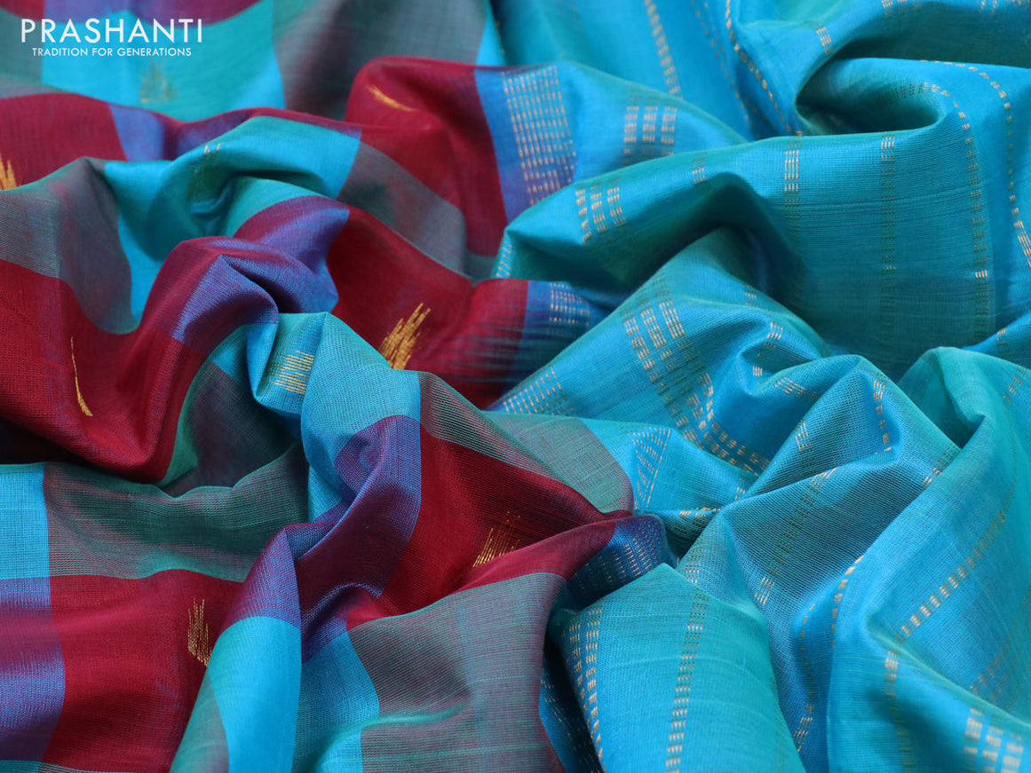 Silk cotton saree maroon and cs blue with allover paalum pazhamum checks & buttas and paisley zari woven border