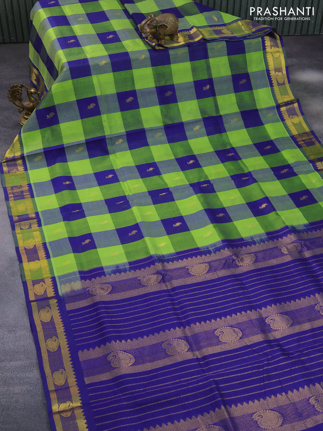 Silk cotton saree light green and blue with allover paalum pazhamum checks & buttas and zari woven border