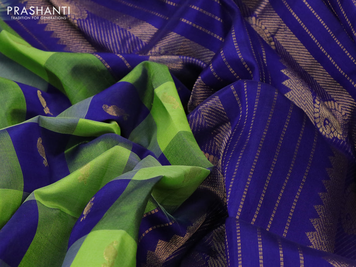 Silk cotton saree light green and blue with allover paalum pazhamum checks & buttas and zari woven border