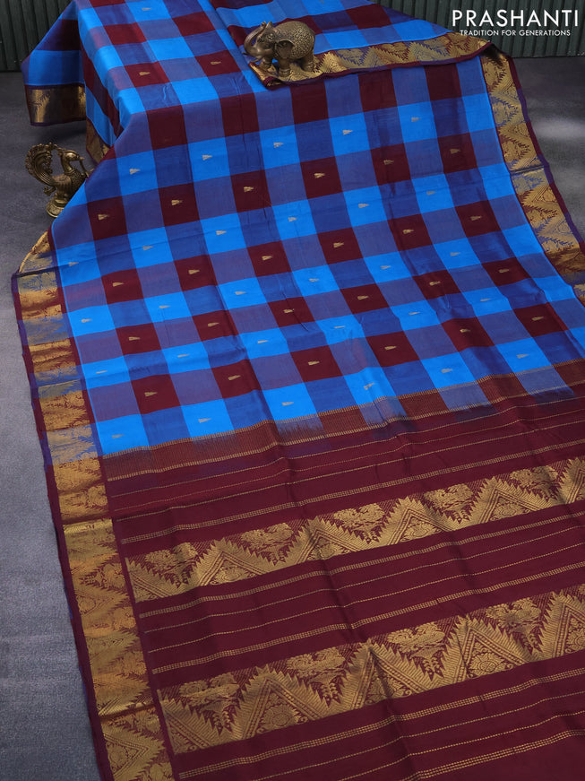 Silk cotton saree cs blue and deep maroon with allover paalum pazhamum checks & buttas and annam zari woven border