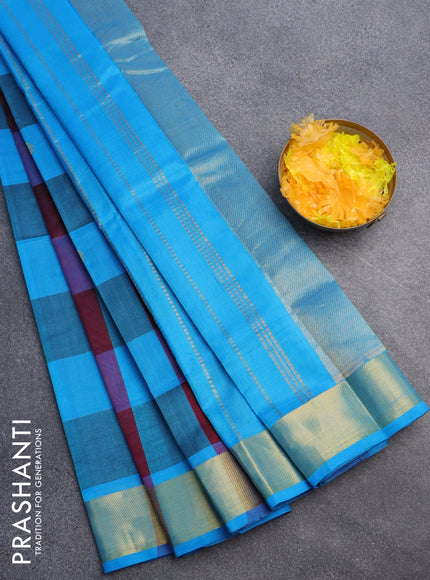 Silk cotton saree deep maroon and light blue with allover paalum pazhamum checks & buttas and zari woven border