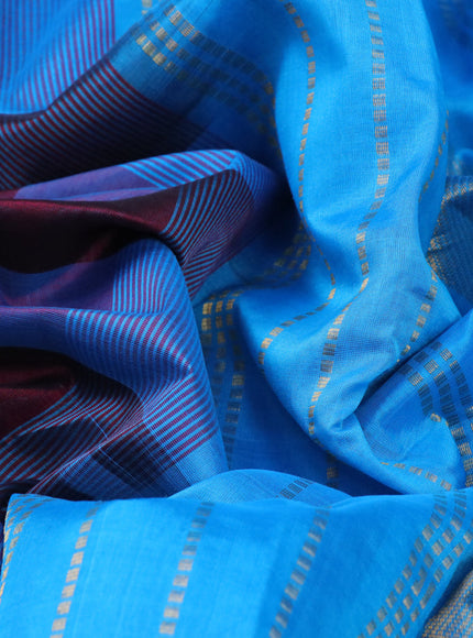 Silk cotton saree deep maroon and light blue with allover paalum pazhamum checks & buttas and zari woven border