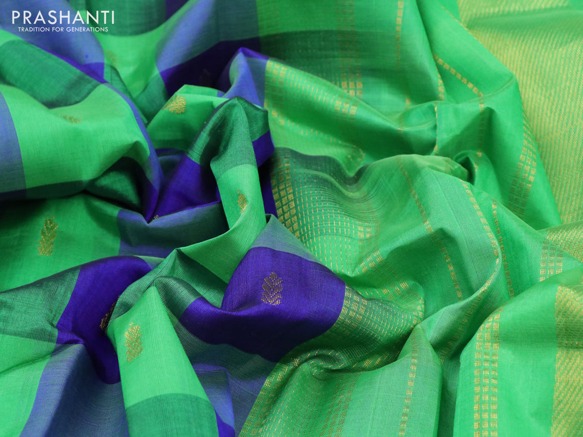 Silk cotton saree light green and blue with allover paalum pazhamum checks & buttas and zari woven border