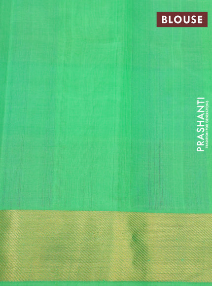 Silk cotton saree light green and blue with allover paalum pazhamum checks & buttas and zari woven border