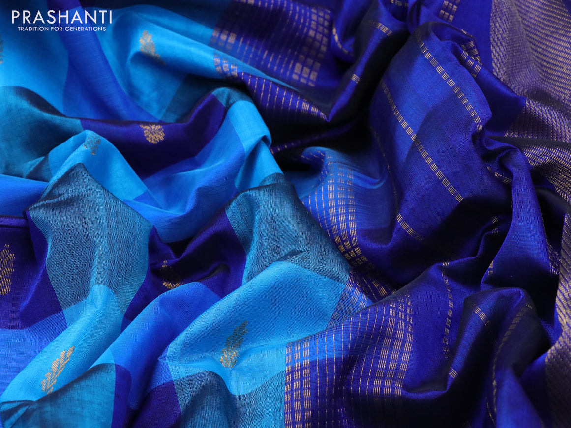 Silk cotton saree light blue and blue with allover paalum pazhamum checks & buttas and zari woven border