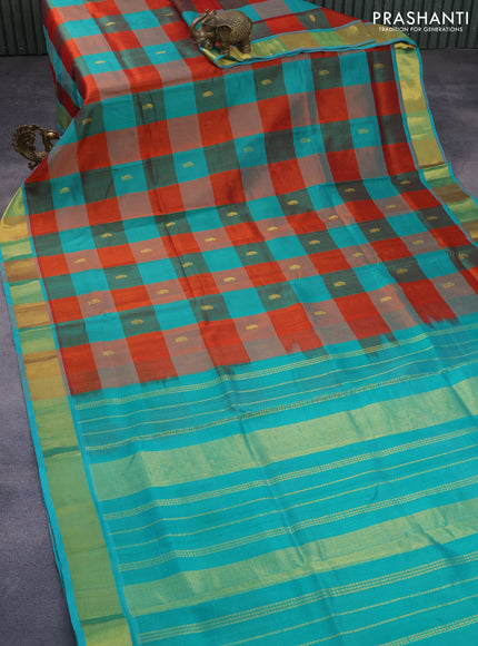 Silk cotton saree rustic orange and teal green with allover paalum pazhamum checks & buttas and zari woven border