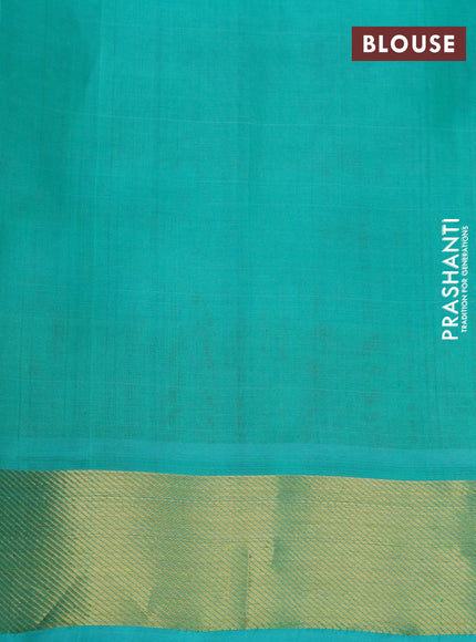 Silk cotton saree rustic orange and teal green with allover paalum pazhamum checks & buttas and zari woven border