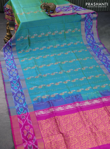 Pure uppada silk saree dual shade of teal bluish green and pink with allover thread & zari woven butta weaves and zari woven ikat border