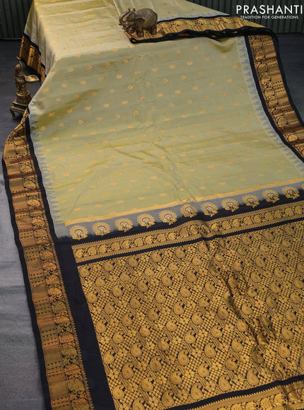 Pure gadwal silk saree elaichi green and black with zari woven buttas and temple design zari woven border