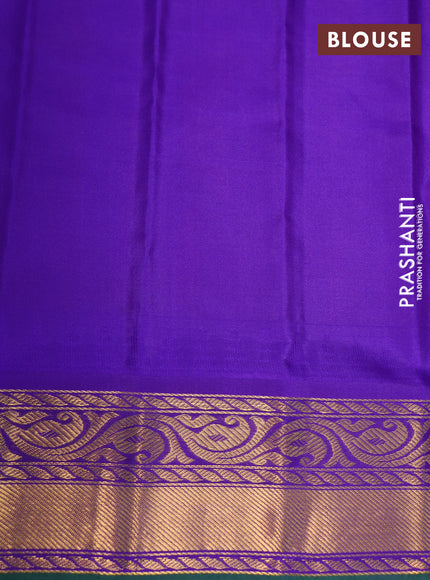 Pure gadwal silk saree dual shade of orange and violet with zari woven floral buttas and temple design zari woven border