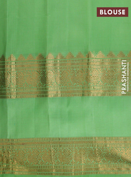 Pure gadwal silk saree purple and light green with silver & gold zari woven buttas and long rettapet zari woven border