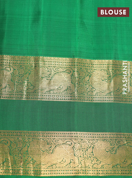 Pure gadwal silk saree pink shade and green with silver & gold zari woven floral buttas and rettapet zari woven border