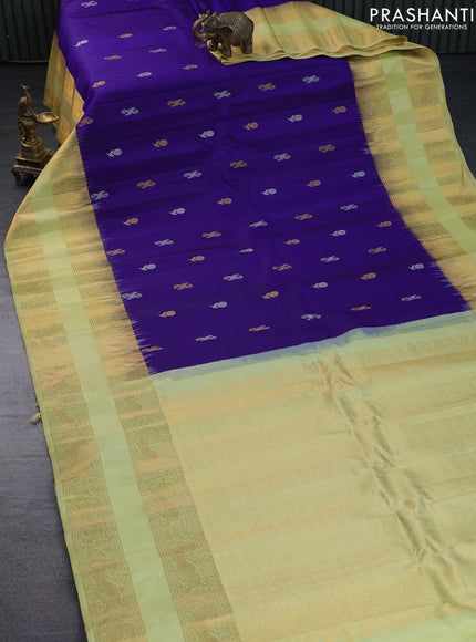 Pure gadwal silk saree blue and pista green with silver & gold zari woven buttas and rettapet zari woven border