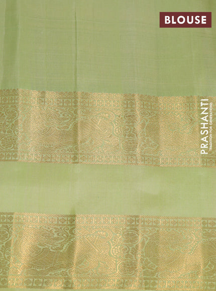 Pure gadwal silk saree blue and pista green with silver & gold zari woven buttas and rettapet zari woven border