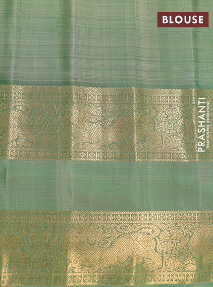 Pure gadwal silk saree magenta pink and pastel green with silver & gold zari woven buttas and rettapet zari woven border