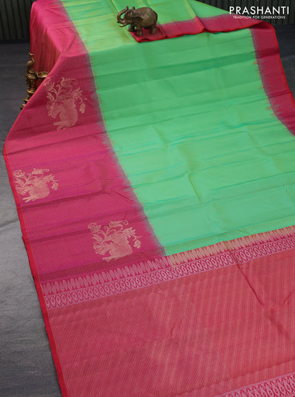 Pure soft silk saree dual shade of green and dual shade of pinkish orange with plain body and long zari checked butta border