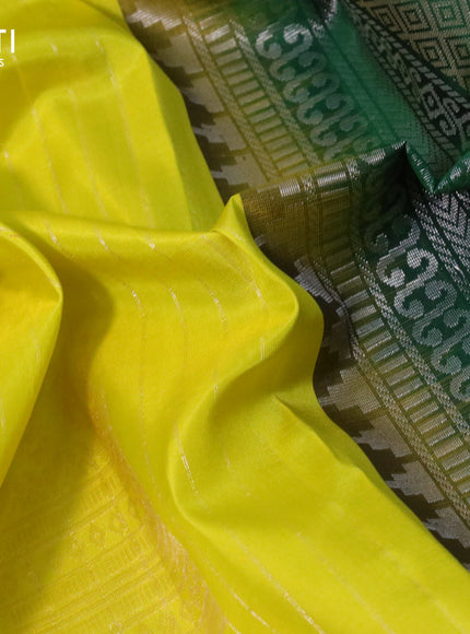 Pure soft silk saree lime yellow and green with allover zari weaves and silver zari woven border