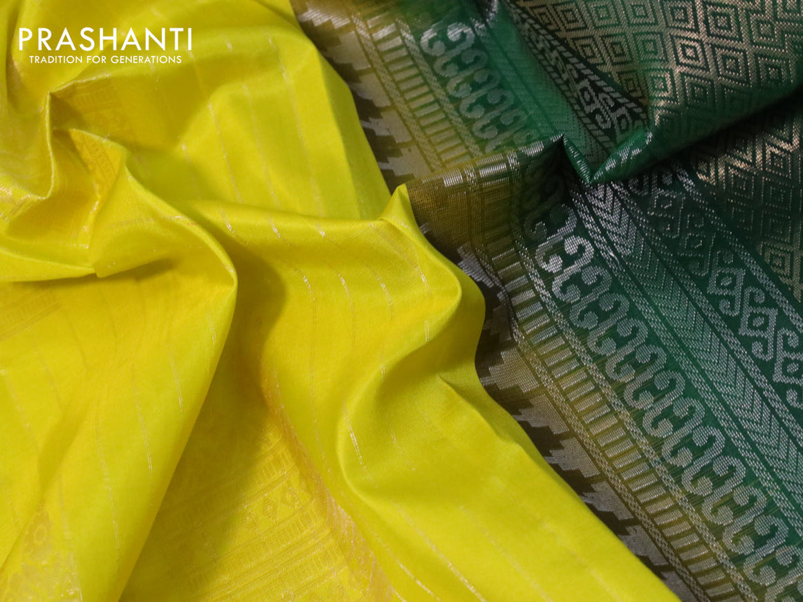 Pure soft silk saree lime yellow and green with allover zari weaves and silver zari woven border