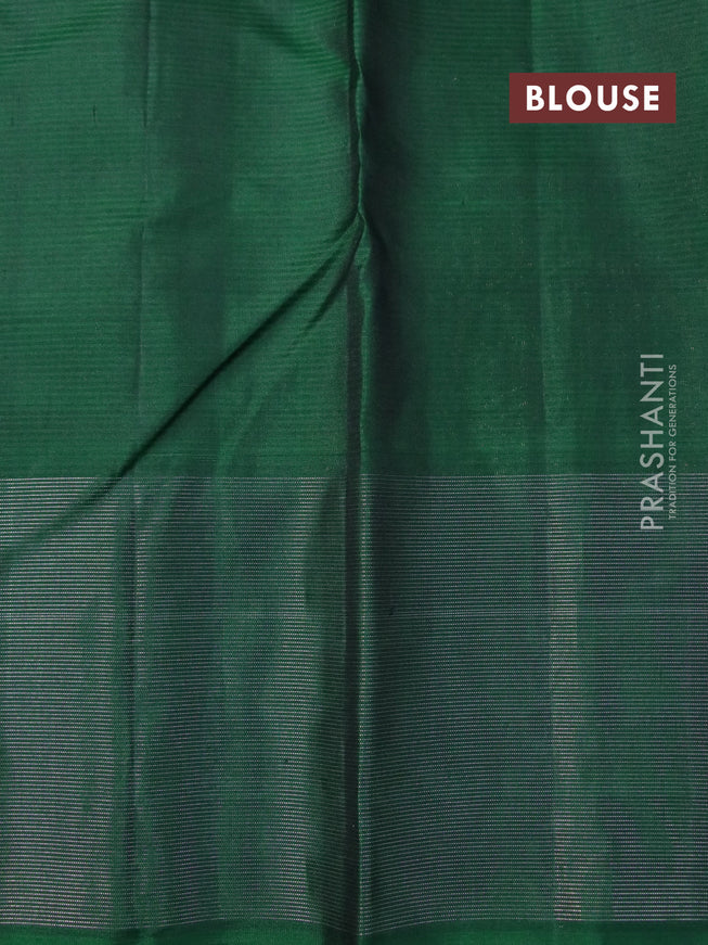 Pure soft silk saree dual shade of pink and green with allover zari weaves and silver zari woven border