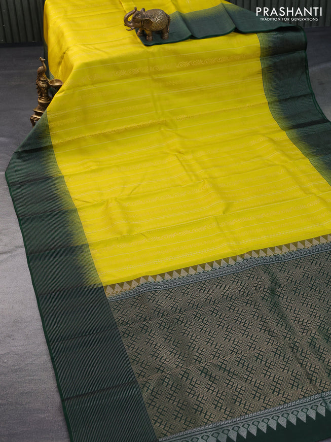 Pure soft silk saree yellow and green with allover zari weaves and silver zari woven border