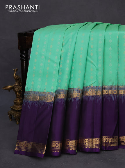 Pure soft silk saree teal green shade and violet with allover silver & gold zari woven butta weaves and long rettapet zari woven border